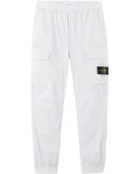 Stone Island - Logo Patch Tapered Leg Trousers - Lyst