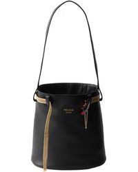 Prada - Buckle Leather Bucket Bag With Jeweled Belt - Lyst