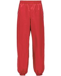 Prada - Re-Nylon Logo Plaque Track Pants - Lyst
