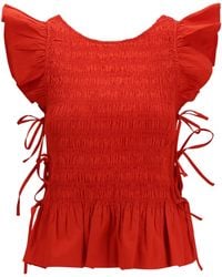 Ganni - Smocked Peplum Tops - Lyst