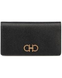 Ferragamo - Ferragamo Gancini Logo Plaque Continental Wallet - Lyst