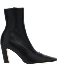 KHAITE - Nevada Square-Toe Ankle Boots - Lyst