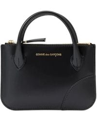 Comme des Garçons - Comme Des Garçons Wallet Logo Printed Wallet - Lyst