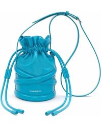 McQueen - Logo Detailed Drawstring Bucket Bag - Lyst