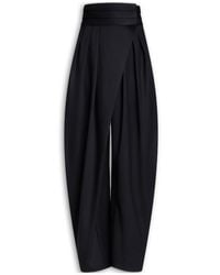 Alaïa - Alaïa High Waist Pleated Pants - Lyst
