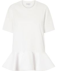 Alaïa - Peplum Cotton-Jersey T-Shirt - Lyst