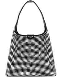 Alaïa - Alaïa Studded Small Hobo Bag - Lyst