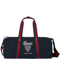 Gucci - Large Printed Canvas Duffle Bag - Lyst