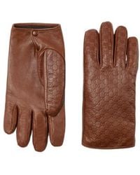 Gucci - Embossed Gg Leather Gloves - Lyst