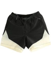 and wander - X Roa Ripstop Wind Shorts - Lyst