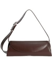 Jil Sander - Cannolo Logo Stamped Small Shoulder Bag - Lyst