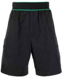 Bottega Veneta - Elasticated Waistband Reverse Logo Shorts - Lyst