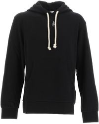 JW Anderson - Jw Anderson Logo Embroidered Drawstring Hoodie - Lyst