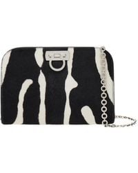 Ferragamo - Ferragamo Diana Zebra Printed Clutch Bag - Lyst
