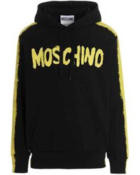 Moschino - Graffiti Logo Printed Drawtring Hoodie - Lyst