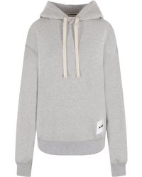 Jil Sander - Logo Patch Drawstring Hoodie - Lyst