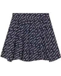 KENZO - Allover Logo Printed Mini Skirt - Lyst