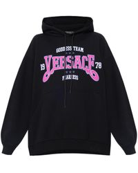 Versace - Logo Printed Drawstring Hoodie - Lyst