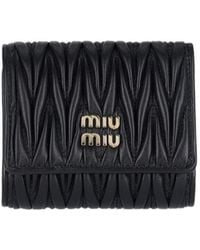 Miu Miu - Logo-Lettering Matelassé Wallet - Lyst