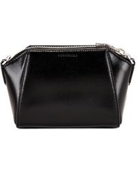 Givenchy - Antigona Logo Embossed Crossbody Bag - Lyst