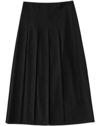 Studio Nicholson - Agat Pleated Midi Skirt - Lyst