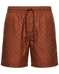 Gucci - Monogrammed Drawstring Swimwear - Lyst
