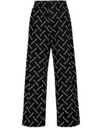 Balenciaga - All-Over Logo Pants - Lyst