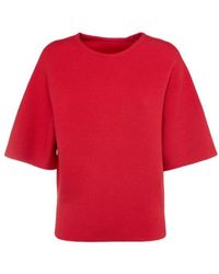 KHAITE - Warren Short Sleeve Compact Wool Top - Lyst