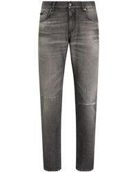 Dolce & Gabbana - Logo Plaque Distressed Jeans - Lyst