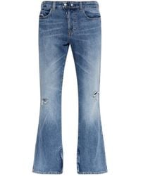 DIESEL - Distressed Flared Jeans - Lyst