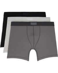 Skims - Logo Boxer Briefs Three-Pack - Lyst