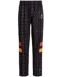 Marcelo Burlon - County Of Milan Logo-Print Loose-Fit Pants - Lyst