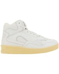 Jil Sander - Logo Embossed Mid-Top Sneakers - Lyst