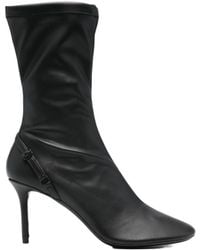 Courreges - Courrèges Oblique Zipped Boots - Lyst