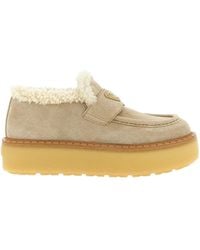 Prada - Triangle-Logo Round-Toe Loafers - Lyst