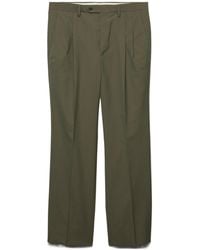 Prada - Wide-Leg Pleated Trousers - Lyst