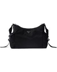 Prada - Explore Re-Nylon And Leather Bag - Lyst