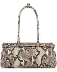 Prada - Triangle-Logo Embossed Shoulder Bag - Lyst