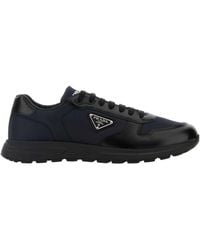 Prada - Logo Plaque Low-Top Sneakers - Lyst