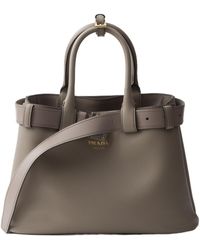 Prada - Buckle Small Leather Handbag With Belt - Lyst