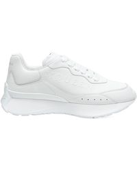 McQueen - Embossed Logo Low-Top Sneakers - Lyst