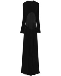 Alaïa - Alaïa Cut-Out Long-Sleeved Maxi Dress - Lyst