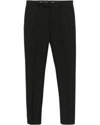 Versace - Logo-Patch Tailored Trousers - Lyst