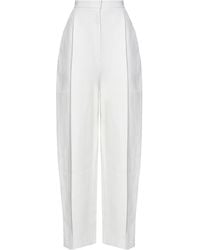 KHAITE - High-Waisted Tapered Leg Trousers - Lyst