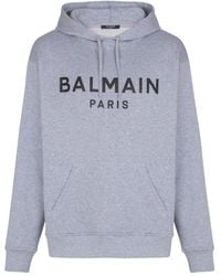 Balmain - Logo Printed Drawstring Hoodie - Lyst
