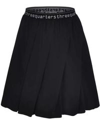 THREE QUARTERS - Letter Logo Pleated Skirt - Lyst