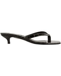TOTEME - Totême Embossed Flip Flops - Lyst