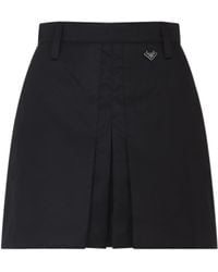 Prada - Triangle-Logo Pleated Mini Skirt - Lyst