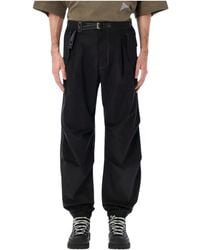 and wander - Side-Zip Hem Pants - Lyst