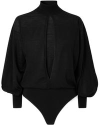 Alaïa - Turtleneck Long-Sleeve Bodysuit - Lyst